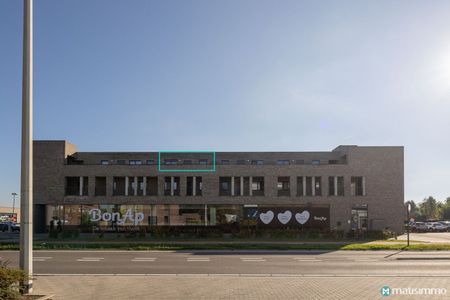 INSTAPKLAAR APPARTEMENT MET 2 SLAAPKAMERS, TERRAS EN AUTOSTAANPLAATS GELEGEN NABIJ HET CENTRUM VAN BILZEN - Photo 2