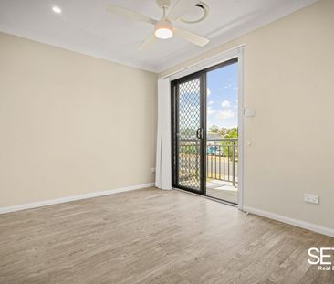 Perfect Family Home with Ducted Air Conditioning - Photo 1