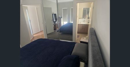 Modern Three-Bedroom Home in a Highly Sought-After Location - Photo 4