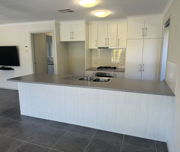 Modern Low Maintenance 3 Bedroom Home – Perfect for the Family! - Photo 6