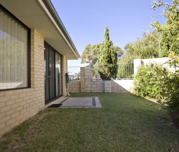 Ideally Located for easy care living - Photo 2