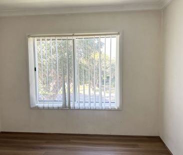 Two bedroom unit - Available Now - Photo 3