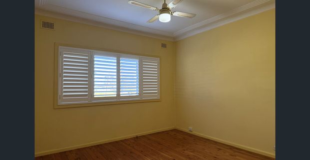 Well Maintained Three Bedroom Home - Photo 1