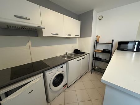 Location Appartement 1 pièce 31m² NIMES 30000 - Photo 2