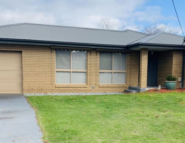 Three Bedroom Home in Great Location - Photo 1