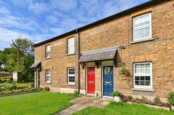 A spacious three bedroom home with allocated parking for two cars. - Photo 1