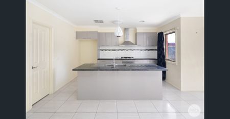 LARGE FAMILY HOME WITHIN WALKING DISTANCE TO LUCAS AMENITIES - Photo 2