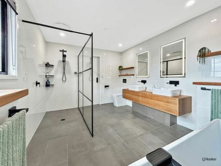 Partially Furnished Luxury Family Home with Pool & Dual-Living Potential - Photo 4