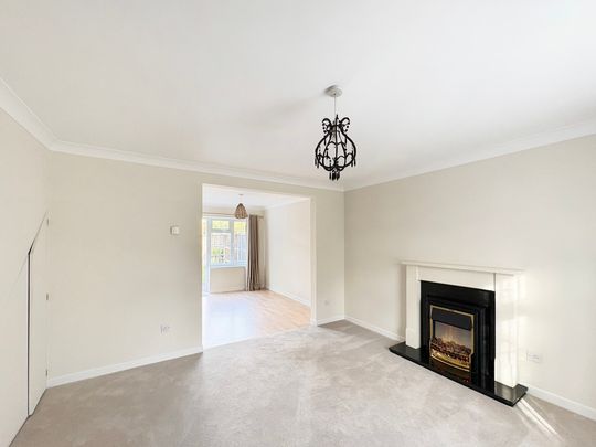 A well maintained three bedroom mid terrace house, available now, with front and rear gardens in an excellent location for Addenbrookes Hospital, access out to the M11 and into the City Centre. - Photo 1