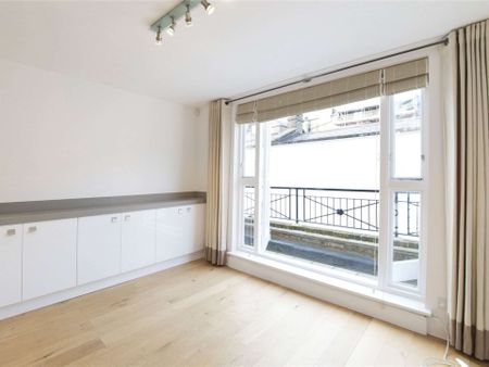 Bright split level period conversion overlooking Onslow Gardens, with wooden floors, high ceilings and private terrace, moments from the amenities of South Kensington. - Photo 3