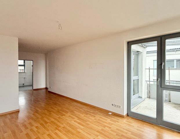 Helle 3-Zimmer-Wohnung mit guter Aufteilung & Balkon - Foto 1