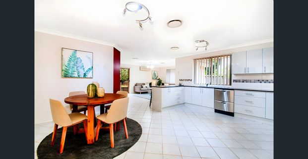 Modern and light filled haven in family friendly locale - Photo 1