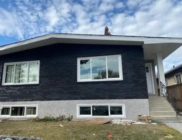 **GREAT LOCATION! RENOVATED MAIN FLOOR ONE BLOCK FROM 17 AVE SE** | 1711 51 Street Southeast, Calgary - Photo 1