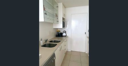 FULLY FURNISHED WATERVIEW APARTMENT WITH STUDY ON LEVEL 23 - Photo 5