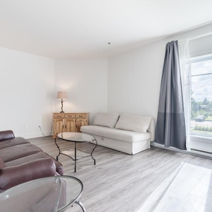 Condo à louer 3 ½ ,756 pc, La Prairie, un stationnement à l’intérieur - Photo 1