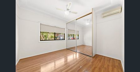 Perfectly Located Three Bedroom Family Home with Air Conditioning! - Photo 3