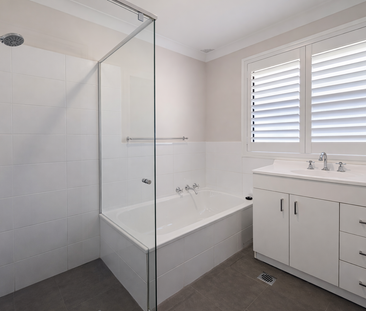 Spacious & Comfortable Family Home in a Convenient Gorokan Location - Photo 2