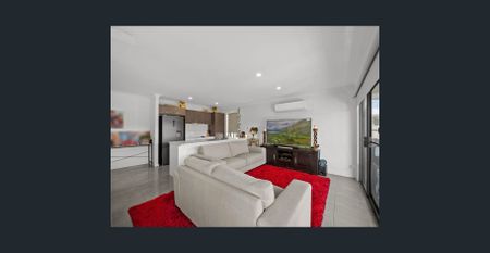 Stylish 4-Bedroom Home in Redbank – Walk to Schools & Shops! - Photo 3