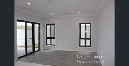Brand New - 4 Bedroom + Multiple Living Areas + Large Yard - Photo 2