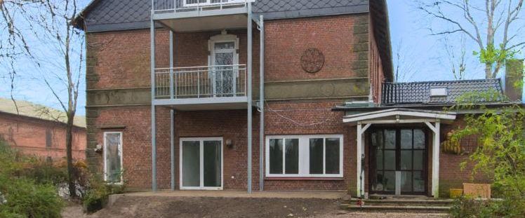 Wohnen wie im eigenen Haus: Großzügige EG-Wohnung mit Garten und Stellplätzen - Foto 1