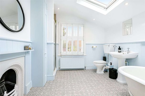 This delightful two-bedroom home offers a perfect blend of comfort and character. - Photo 1