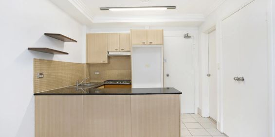 North facing modern one bedroom courtyard apartment in the resort-style complex. The rear of the building - Photo 3