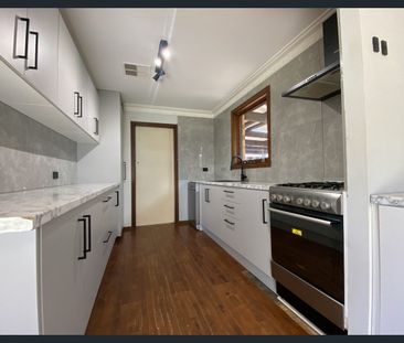 Spacious 4-Bedroom Family Haven with Exceptional Outdoor Living - Photo 3