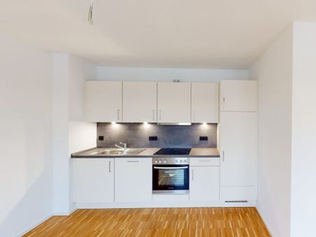 Große Dachgeschosswohnung mit Einbauküche - Photo 4