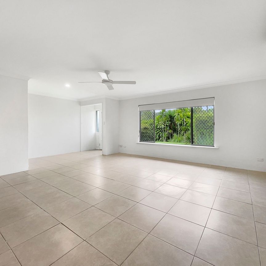 Charming Home in Palmwoods with Solar & Lawn Maintenance Included! - Photo 1