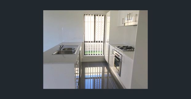 Modern Comfort in Peaceful Ormeau Hills - Photo 1