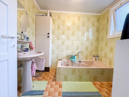 Charmante rustig gelegen woning met ruime tuin en garage! - Photo 4