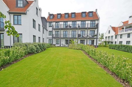 Mooi gemeubeld tuin appartement in duinenwater - Photo 3