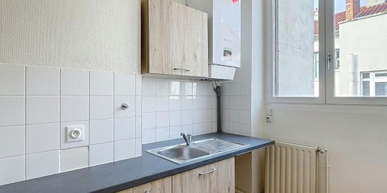 Lyon 6ème : Emplacement privilégié T3 en étage élevé avec cuisine aménagée - Photo 3