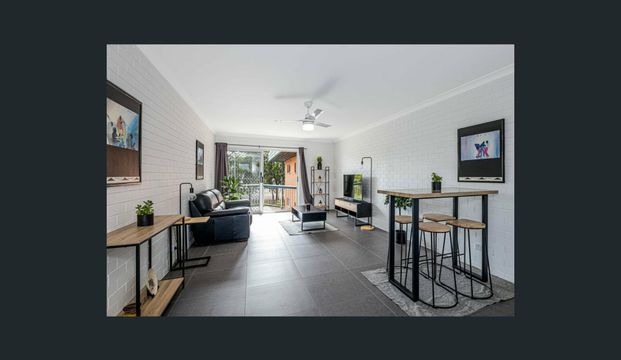 TOP FLOOR RENOVATED UNIT IN BONGAREE - Photo 1
