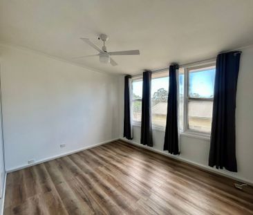 FRESHLY UPDATED HOME IN A FAMILY-FRIENDLY LOCATION - Photo 4