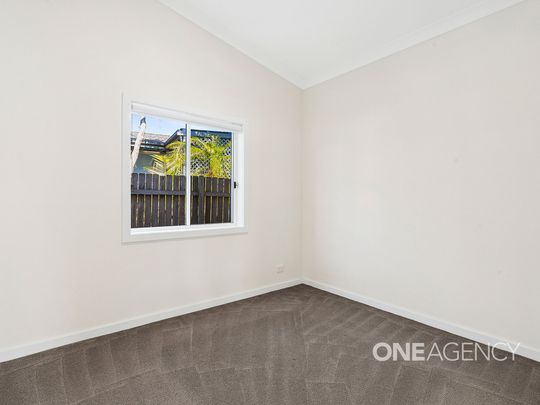 TWO-BEDROOM HOME OFFERING YEAR ROUND COMFORT - Photo 1