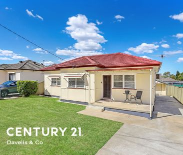 Spacious Three-Bedroom Family Home in Prime Location - Photo 1