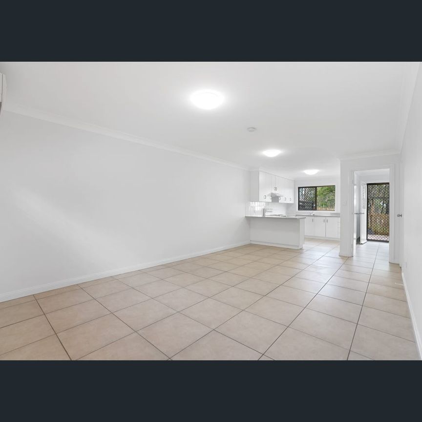 Spacious Two-Bedroom Townhouse in Convenient Location - Photo 1