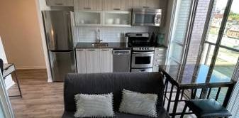 Stylish 1 Bed, 1 Bath with Private Roof Top Patio and Air Conditioning - Photo 2