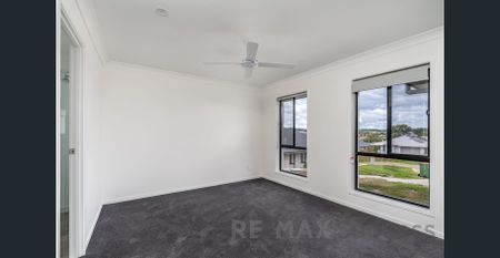 Modern Family Living with Multiple Living Areas in Convenient Glenvale Location - Photo 3