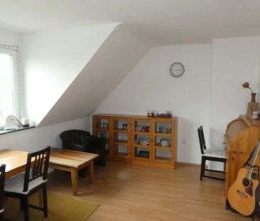 Hübsche 2-Zimmer-Dachgeschoss-Wohnung im Herzen von Asberg - Photo 1