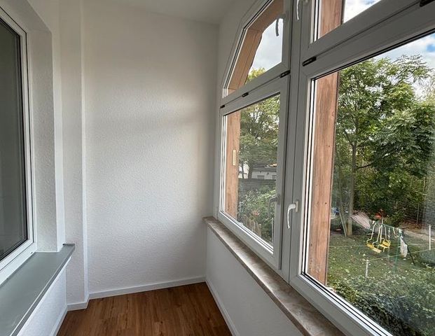 helle Drei-Raumwohnung für Familien mit Wintergarten - Photo 1