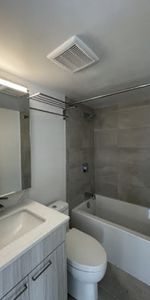 SKYLINE APARTMENTS - Photo 4