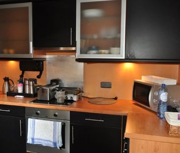 Charmante woning met 2 slaapkamers en ruime tuin. - Photo 1