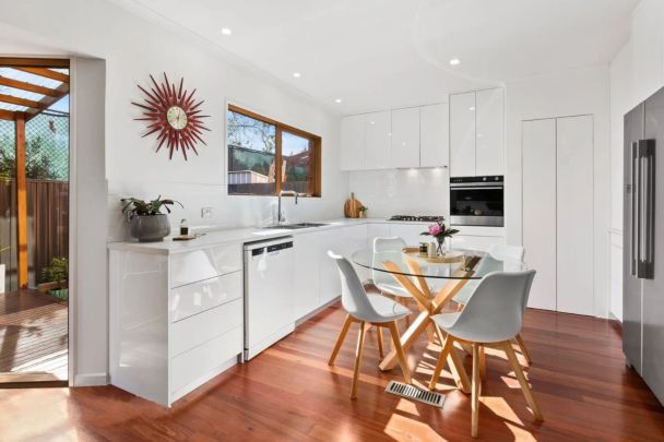 Modern Townhouse Sanctuary in Prime Locale! - Photo 1