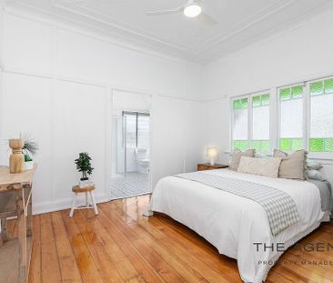 Comfortable 3-Bedroom Home in Convenient Berserker Location - Photo 1