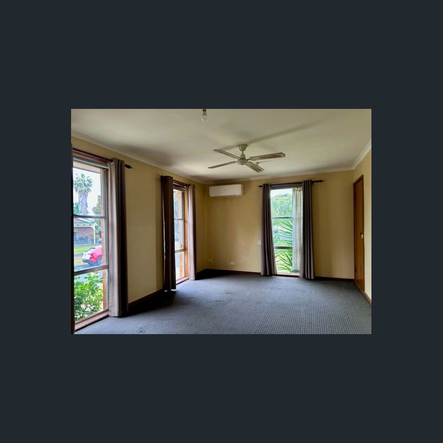 NEAT & TIDY THREE BEDROOM HOME - Photo 1