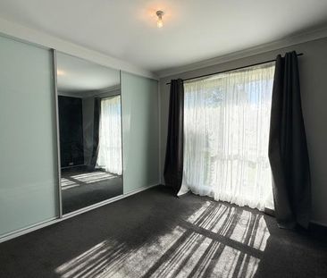 Peaceful Suburban Living in a Central, Well-Connected Location - Photo 5