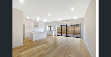 Beautifully Designed 4-Bedroom Family Home in Prime Location - Photo 3