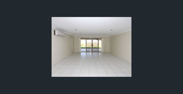 SPACIOUS FAMILY HOME WITH SECURE YARD - Photo 1